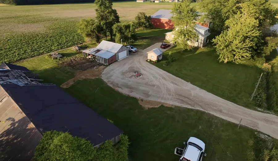 Aerial view of a new gravel drive and turnaround at a country home